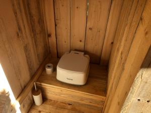 an inside view of a small stove in a sauna at U pěti veverek in Humpolec