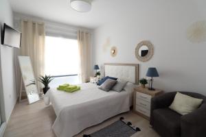 Posteľ alebo postele v izbe v ubytovaní Apartment Infinity Beach, edf Pinada Beach, La Mata, Torrevieja