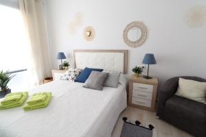 Posteľ alebo postele v izbe v ubytovaní Apartment Infinity Beach, edf Pinada Beach, La Mata, Torrevieja