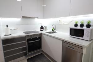Kuchyňa alebo kuchynka v ubytovaní Apartment Infinity Beach, edf Pinada Beach, La Mata, Torrevieja