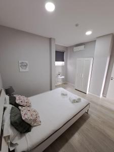 Katil atau katil-katil dalam bilik di Bolhão Apartment