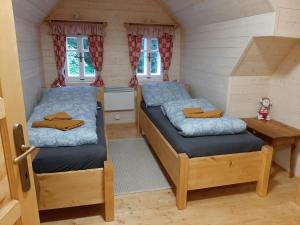Postel nebo postele na pokoji v ubytování Bratrouchovský trpaslík + 9 fotografií
