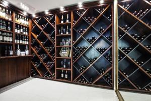 a wine cellar with a wall of wine bottles at Grand Lubicz Uzdrowisko Ustka in Ustka
