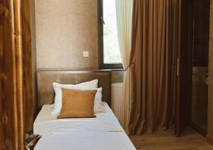 Postel nebo postele na pokoji v ubytování Hotel Nordmann,Racha