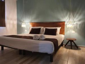 Postel nebo postele na pokoji v ubytování Hotelito El Cuyo + 37 fotografií
