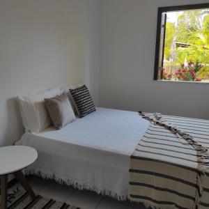 Lagoa dourada - Ilha de Itaparica - Salvador da Bahia - Club Med tesisinde bir odada yatak veya yataklar