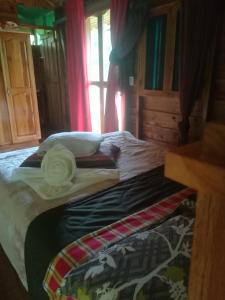 Posteľ alebo postele v izbe v ubytovaní Corredores del Pacuare