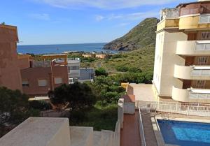 a view of the ocean from the balcony of a building at Brisa de Cala reona in Cabo de Palos