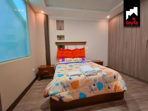 Postel nebo postele na pokoji v ubytování TEYFA Hospedaje - Edificio