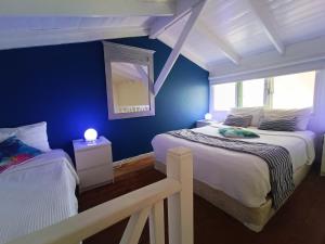Postel nebo postele na pokoji v ubytování BUNGALOW 3111 OCEAN VIEW + 21 fotografií