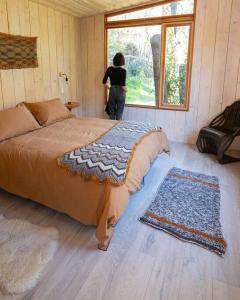 מיטה או מיטות בחדר ב-Casa clara San Alfonso