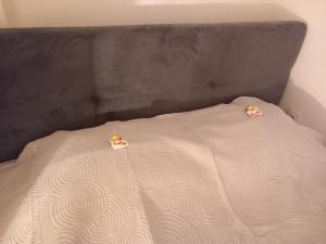 Llit o llits en una habitació de Apartman Una