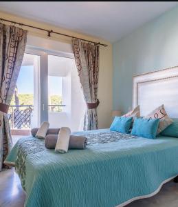 Ένα ή περισσότερα κρεβάτια σε δωμάτιο στο Mi capricho beach front