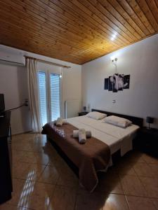 A bed or beds in a room at Villa Erofili Plakias south Rethimno Crete