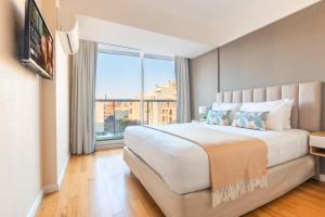 מיטה או מיטות בחדר ב-Modern&New Apartment in Palermo