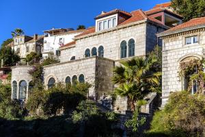 a house on the side of a hill at Villa Mediteran in Dubrovnik