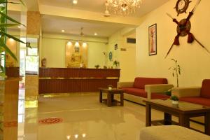 a lobby with a waiting area with a waiting room at Andaman Galley Boutique Hotel in Port Blair