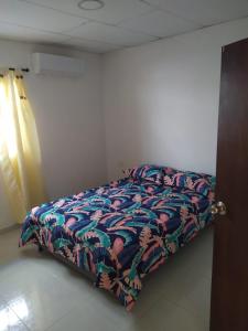 Кровать или кровати в номере Casa Caribe