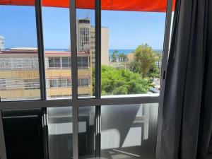 a view from a window of a building at Apartamento C y L in Torremolinos