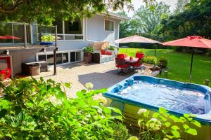 The swimming pool at or close to Nature Oasis BarMar 2BR Suite in Dundas close to Webster Falls