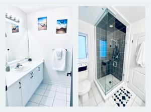 La salle de bains est pourvue d'un lavabo et d'une douche. dans l'établissement Brand new luxurious home, located in Lindsay., à Kawartha Lakes