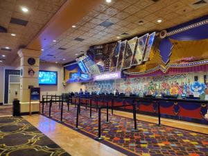 a bar in a casino with a lot of drinks at Comfy Unit at Orleans Casino Strip Las Vegas in Las Vegas