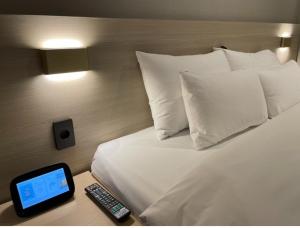 Postel nebo postele na pokoji v ubytování Hotel SUMMIT