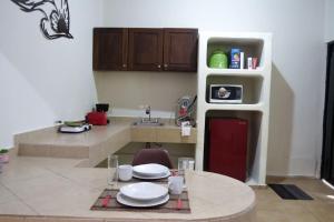 Η κουζίνα ή μικρή κουζίνα στο Oliva's Tiny House +8 φωτογραφίες