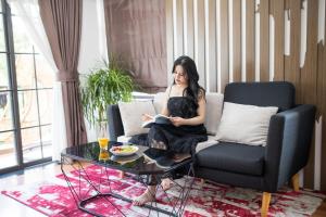 Posezení v ubytování Khai Ngoc Hotel Da Lat City