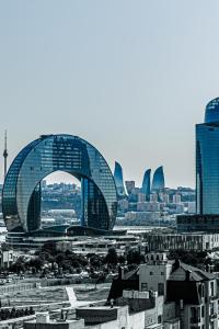 a black and white photo of a city with buildings at Baku Sea View 3 bedroom in Baku