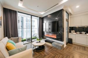 Η κουζίνα ή μικρή κουζίνα στο Shendo Vinhomes Metropolis