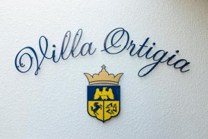 Certifikát, hodnocení, plakát nebo jiný dokument vystavený v ubytování Villa Ortigia