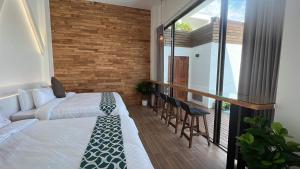 Letto o letti in una camera di Mou Xia Villa