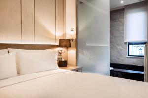 Katil atau katil-katil dalam bilik di Hotel Valletta