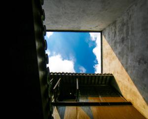 a view of the sky from the inside of a building at Tingjian Guli Private Bath Design Homestay - Nanxun Ancient Town Baijianlou Scenic Area in Huzhou