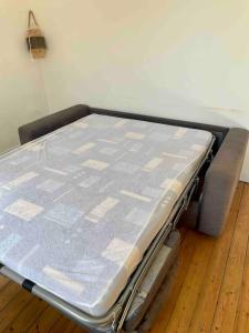 a mattress sitting on the floor in a room at Confort et Nature à Berck-Plage - détente ou travail - wifi in Berck-sur-Mer