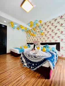 Postel nebo postele na pokoji v ubytování Dalat Eco Hotel