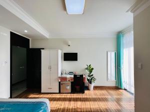 TV a/nebo společenská místnost v ubytování Dalat Eco Hotel