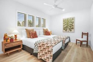 The Santana Collection TWO - Luxury Accomodation in the heart of Palm Cove客房内的一张或多张床位