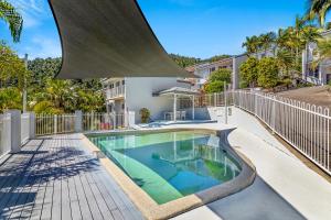 a swimming pool in the backyard of a house at The View in Cannonvale