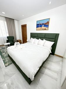 Un pat sau paturi într-o cameră la Hotel Sand View