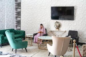 Un televizor și/sau centru de divertisment la Hotel Sand View