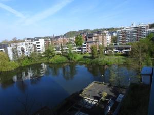 a view of a river in a city with buildings at 2 Zimmer Wohnung zum Auspowern oder Erholen. in Erkrath