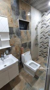 Phòng tắm tại GoldenPirshaghi