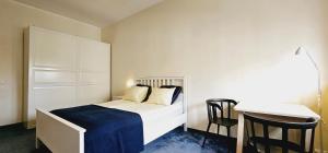 Posteľ alebo postele v izbe v ubytovaní Apartament 52 City Center