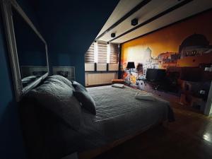Postel nebo postele na pokoji v ubytování MM Apartman