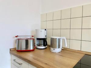 Gemütliche Wohnung in Siegen tesisinde mutfak veya mini mutfak