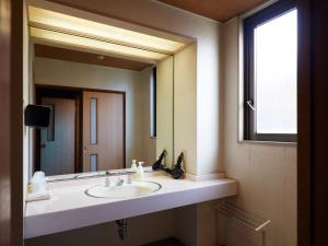 Koupelna v ubytování Sakura no Yakata Hotel