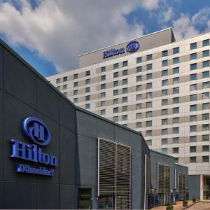 a hotel building with alderman sign on top of it at Hilton Düsseldorf in Düsseldorf