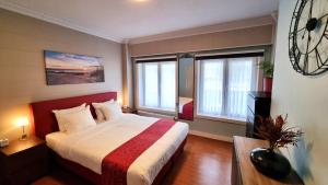 Postel nebo postele na pokoji v ubytování Hotel Cardiff + 37 fotografií
